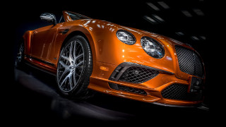 Orange car headlights black background - feature free wallpaper