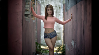 Woman pink shirt shorts alleyoutstretched - short shorts free wallpaper