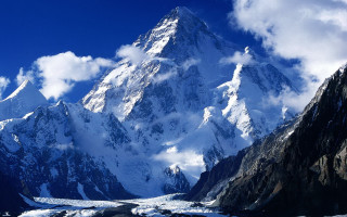 Mountain range snowy foreground river - a mountain range free wallpaper