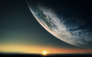 Large planet sunset horizon ocean - a sun free wallpaper for desktop