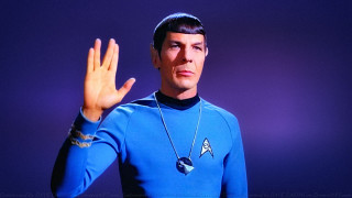 Man blue shirt hand up - the side of his face free wallpaper