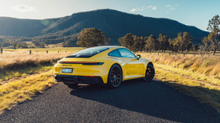 Yellow sports car mountain road - andrew law free wallpaper