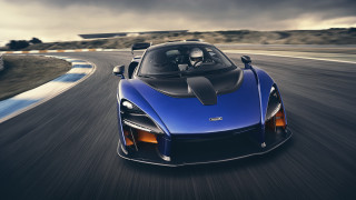 Blue sports car driving cloudy - a blue sports car free wallpaper for desktop