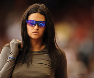 Woman sunglasses brown shirt handbag - eva švankmajerová free wallpaper