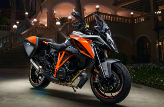 Motorcycle building night lights staircase - path free wallpaper