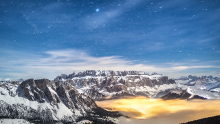 Mountain range snowy sky stars - a few snow covered mountains free wallpaper