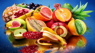 Fruit pile blue surface background - arcimboldo free wallpaper