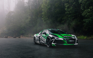 Green black sports car forest - andrew stevovich free wallpaper