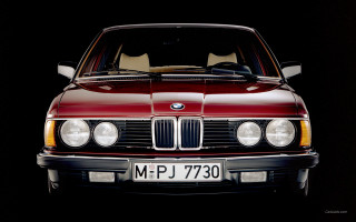 Red car black background ultrafine - bernt tunold free wallpaper