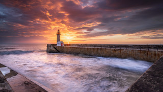 Lighthouse pier sunset waves water - a pier free wallpaper