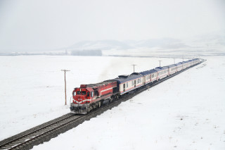 Train snowy countryside power lines - a snowy day free wallpaper