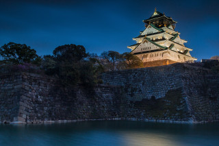 Castle moat clocktower night eastern - a body of water below free wallpaper