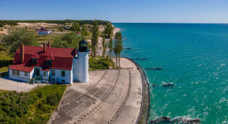 Lighthouse cliff ocean beach tiltshift - aerial free wallpaper