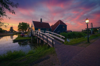 Bridge river house red roof - a bridge over a river free wallpaper