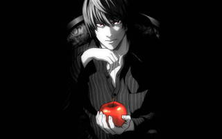 Man holding apple black background - an apple free wallpaper