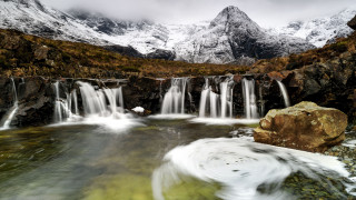 Waterfall snow mountains stream rock - the background and a stream free wallpaper
