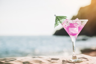 Pink drink green leaf beach - a view of the ocean in the background free wallpaper