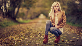 Woman blonde jeans forest portrait - the ground and trees free wallpaper