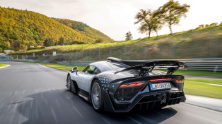 Black sports car surfboard road - ultra free wallpaper
