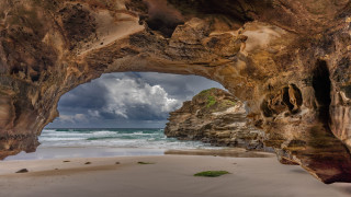 Cave ocean clouds beach rocky - free landscape wallpaper