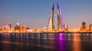Tall building spire city lights 2 - night time free wallpaper for desktop