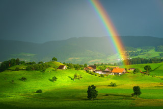 Rainbow green hillside houses trees 2 - free landscape wallpaper