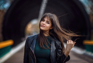 Woman long hair tunnel smiling - a tunnel free wallpaper
