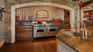 Kitchen stove sink stonewall woodenfloor - a stone wall behind free wallpaper
