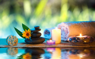 Towel candle flower water reflection - a reflection of the sun free wallpaper