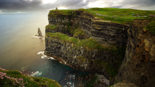 Cliff lighthouse ocean sunset landscape - the ocean and a cliff free wallpaper