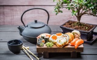 Sushi platter teapot bonsai wooden - a wooden table free wallpaper