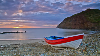 Boat beach sunset rocky shore - a rocky shore free wallpaper