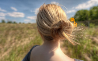 Woman bun field flowers sky - elinor proby adams free wallpaper