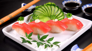 Sushi plate chopsticks sauces bowl - a plate of sushi free wallpaper