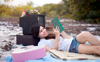 Woman lying beach book flower - free other wallpaper