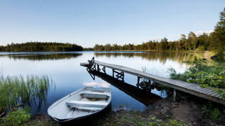 Lake dock boat forest mountain - akseli gallenkallela free wallpaper