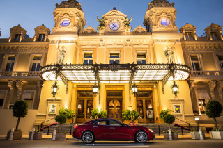 Red car building clock tower - a clock tower free wallpaper