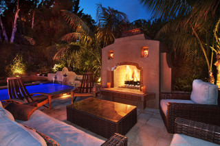 Patio fireplace seating pool night - warm free wallpaper