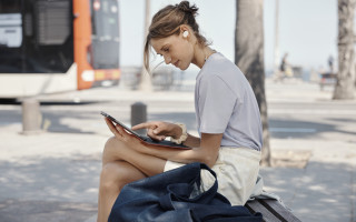 Woman bench tablet earbuds bus - product photo free wallpaper