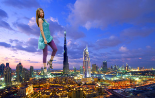 Woman cityskyline night skyscraper bridge - a ledge in front free wallpaper