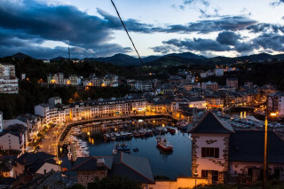 Harbor boats buildings night cloudy - a harbor free wallpaper