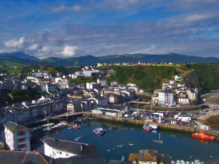 City harbor boats mountains clouds - a harbor free wallpaper