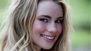 Blonde woman smiling blue eyes 2 - shaded free wallpaper