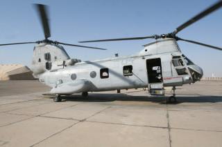 Helicopter tarmac building sky background - a helicopter free wallpaper