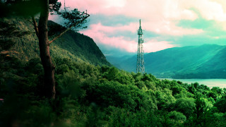 Tower forest lake mountains clouds - bernt tunold free wallpaper