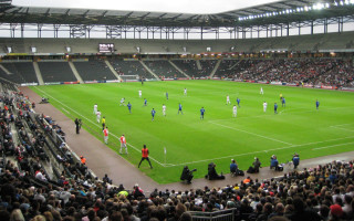 Soccer field crowd stands middle - don arday free wallpaper