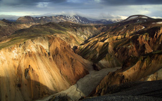 Mountain range river snow capped 5 - a view of a mountain range free wallpaper