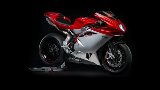 Red motorcycle parked black background - ray free wallpaper