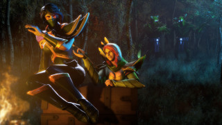 Women sitting chest woods fire - low free wallpaper