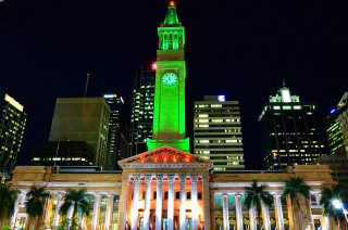 Large building clock tower night 20 - night time in a city free wallpaper